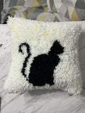 Black cat cushion
